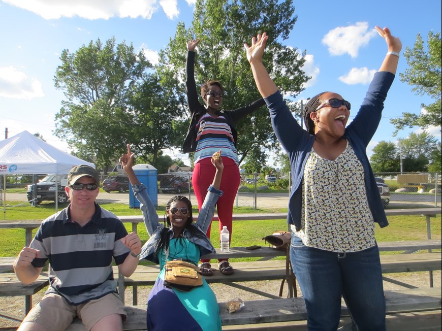 group of spectators cheering